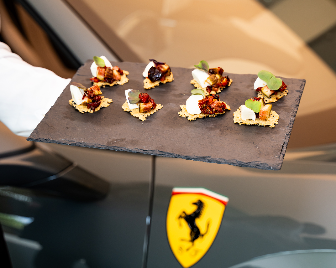 Premium canapés on tray at exclusive Ferrari Sydney cocktail party
