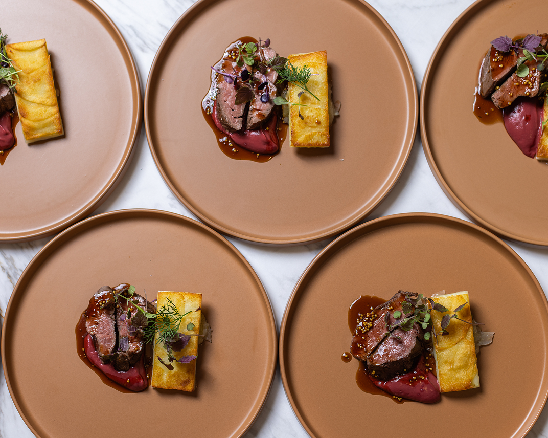 Plated fine dining meal at Sydney corporate catering event