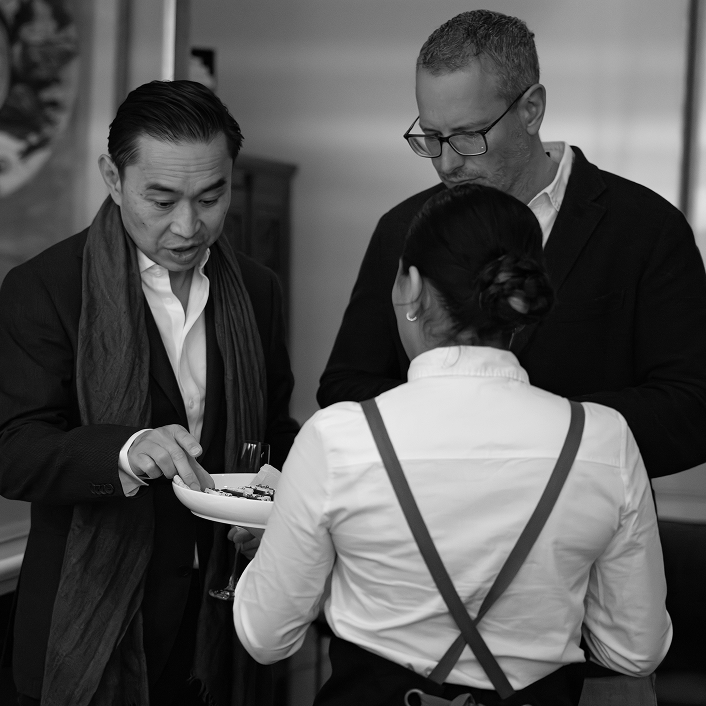 Guests enjoying canapés at Sydney home party catering