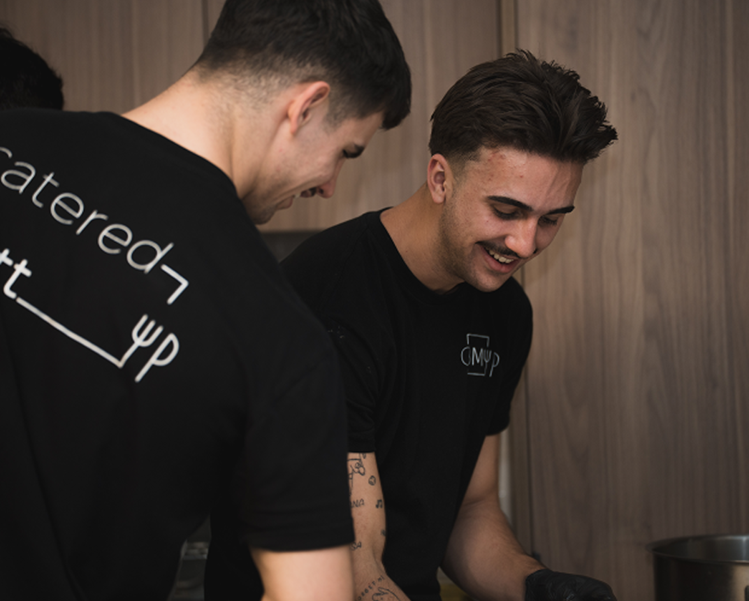 Chef Matt checking buffet at Meriton Suites corporate catering