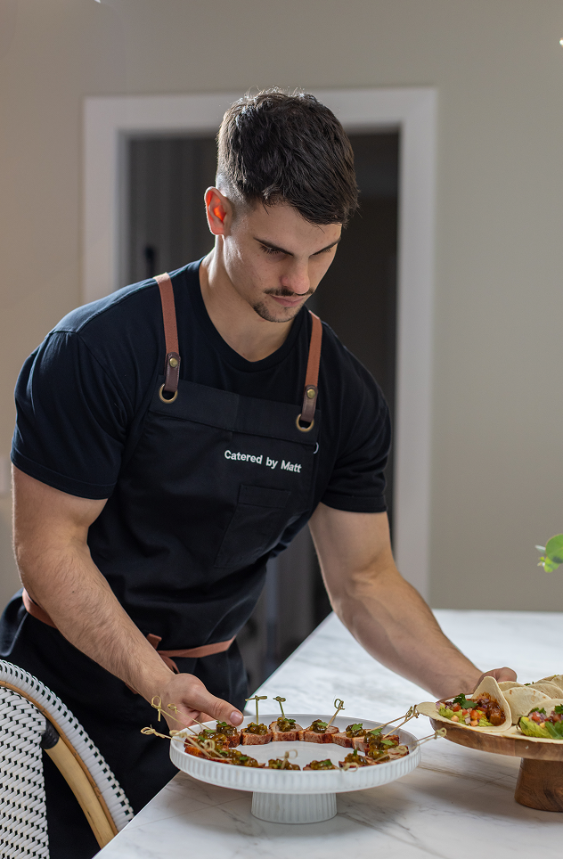 Chef Matt preparing canapés for service at Dural private catering