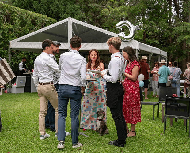 Guests enjoying savoury canapés at a Sydney wedding catering event