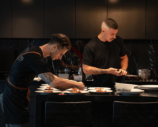Chef Vinnie and Chef George preparing a degustation course at a Sydney event