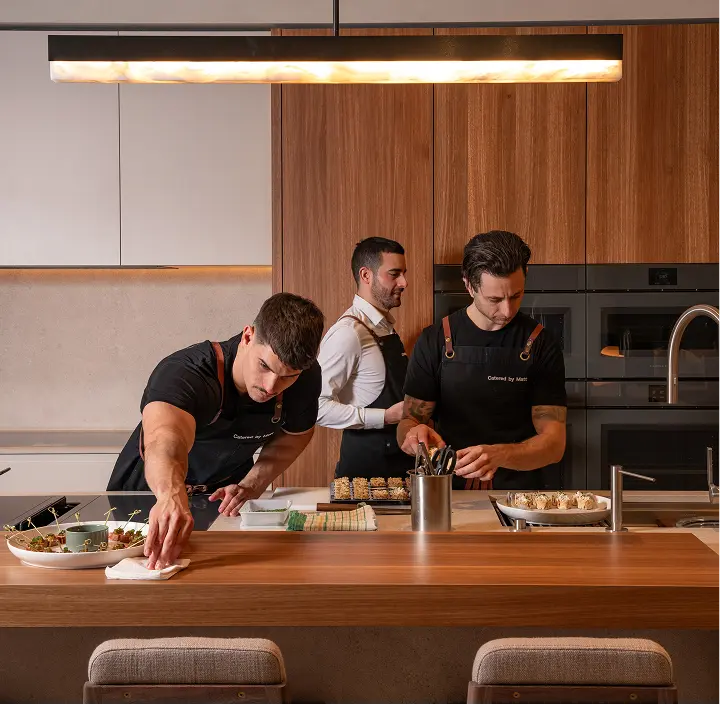 Catered by Matt chefs and waitstaff plating canapés for an 80 guest celebration