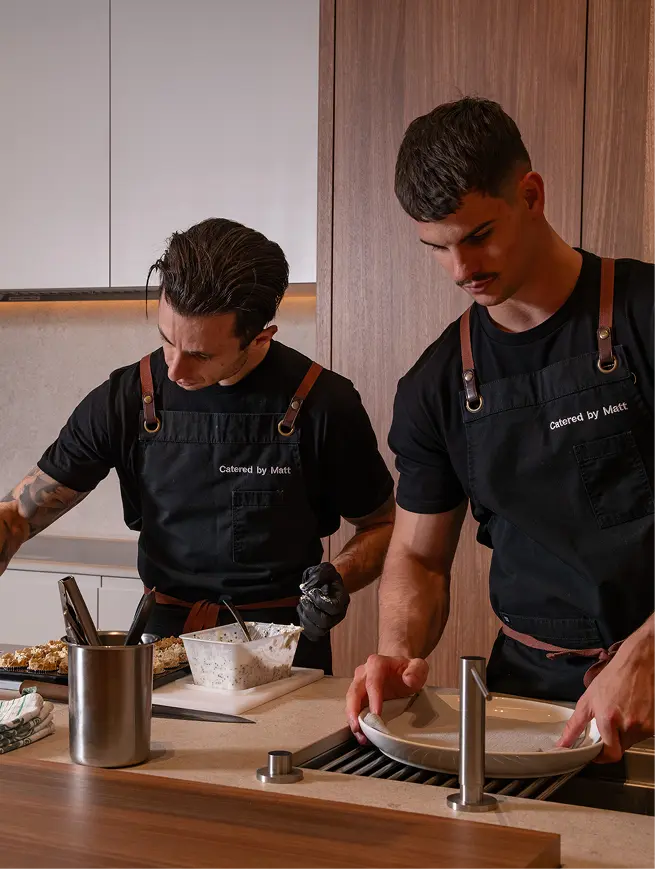 Catered by Matt chefs plating canapés in the kitchen for an 80 guest corporate event