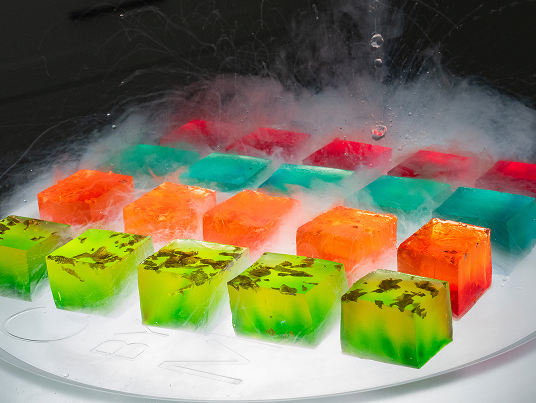 Colorful cocktail jellies with liquid nitrogen served at a business lunch