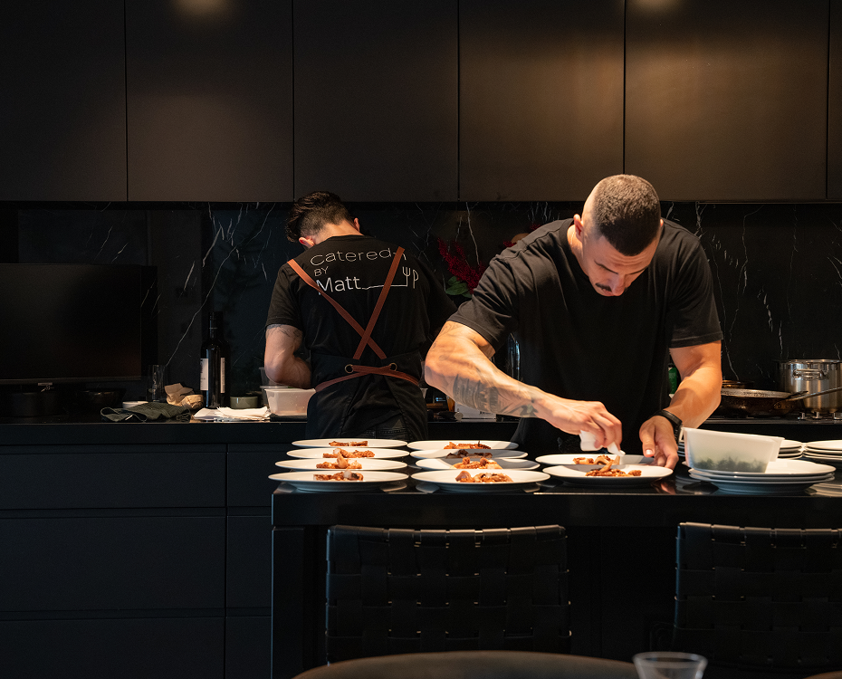 Catered by Matt chefs plating dishes in a Sydney kitchen