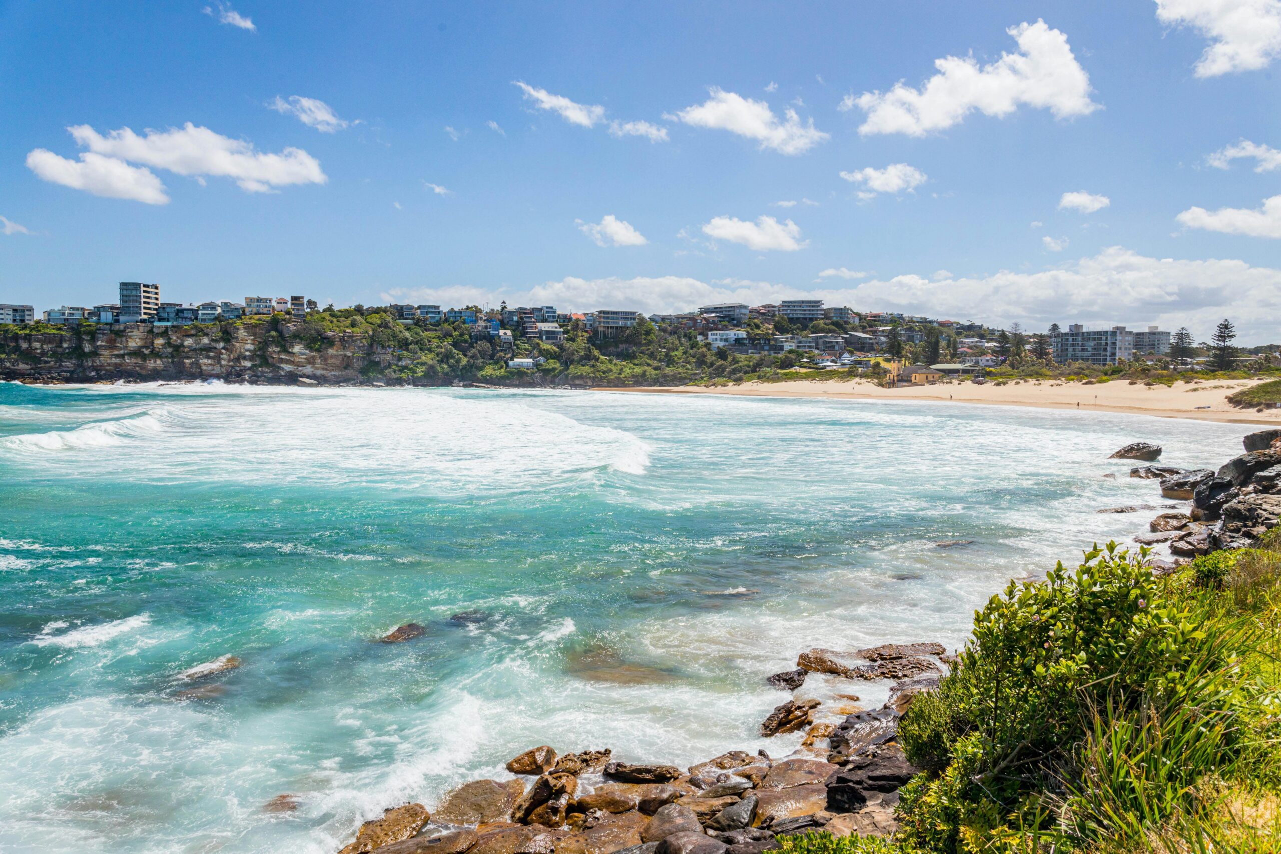 Freshwater Beach in NSW with sand, ocean and coastal views