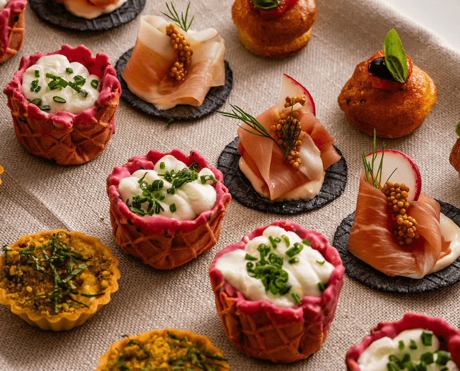 Premium catering Surry Hills with prosciutto canapés, tartlets and arancini