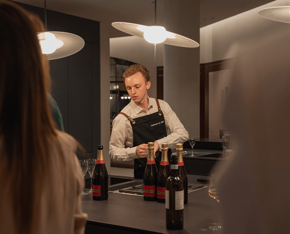 Team building catering Sydney staff providing beverage service at a corporate event