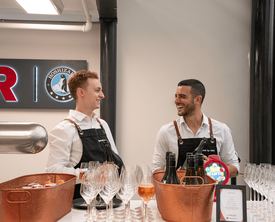 Event staff providing beverage service at a Sydney product launch