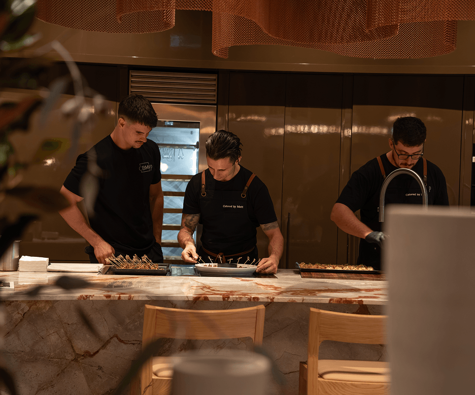 Chef Matt serving canapés at 80-guest corporate Ferrari Sydney event