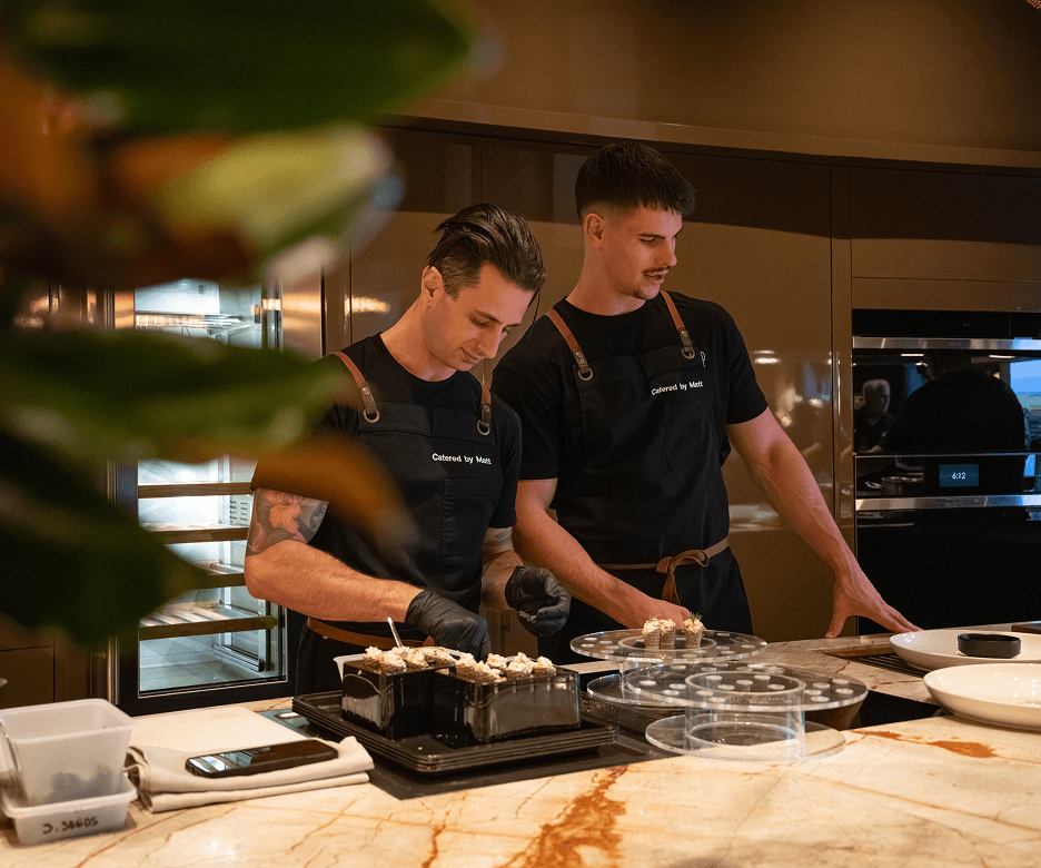 Catering Macquarie Park chefs preparing gourmet canapés for guests