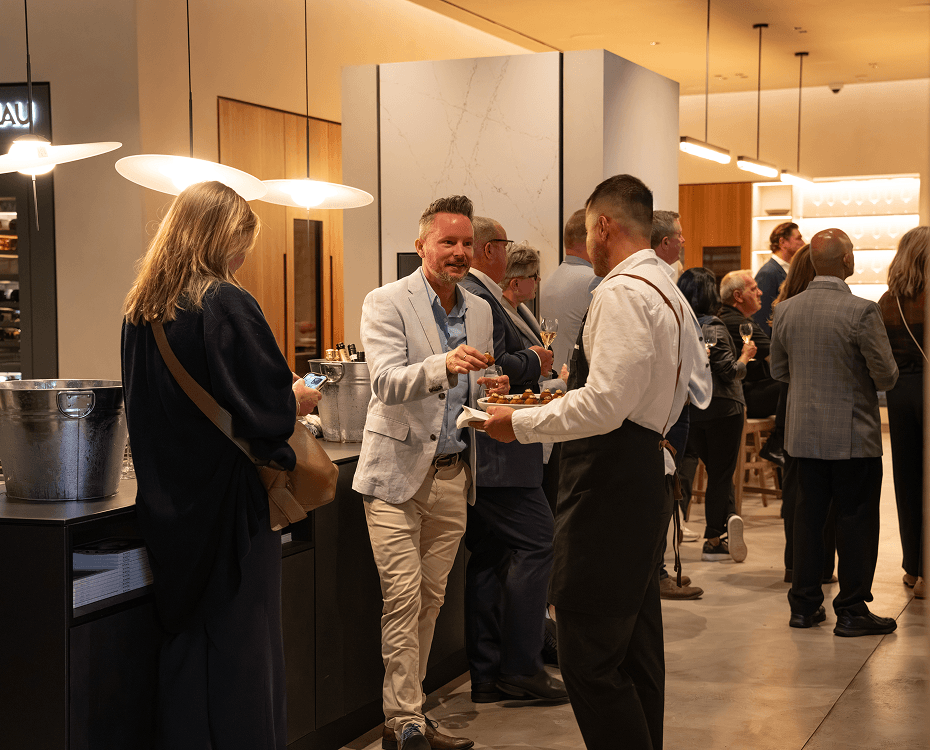 Sydney Conference catering staff serving canapés during a delegate networking session