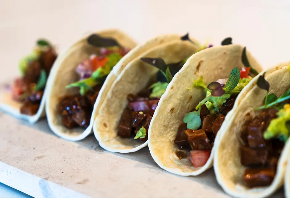 Soft tacos filled with braised beef and fresh salsa for a Castle Hill event