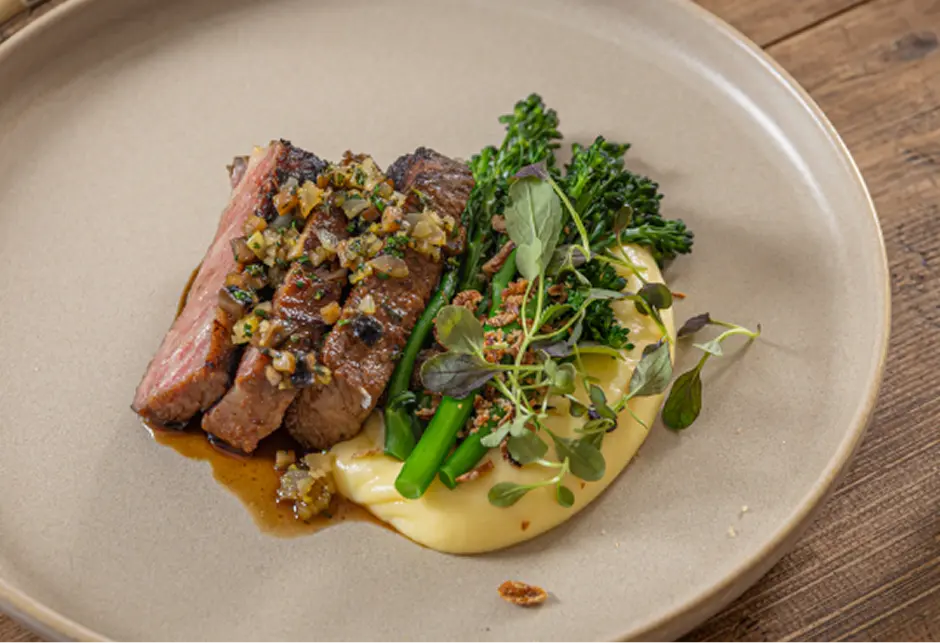 Plated steak with broccolini and purée for a Sutherland Shire degustation