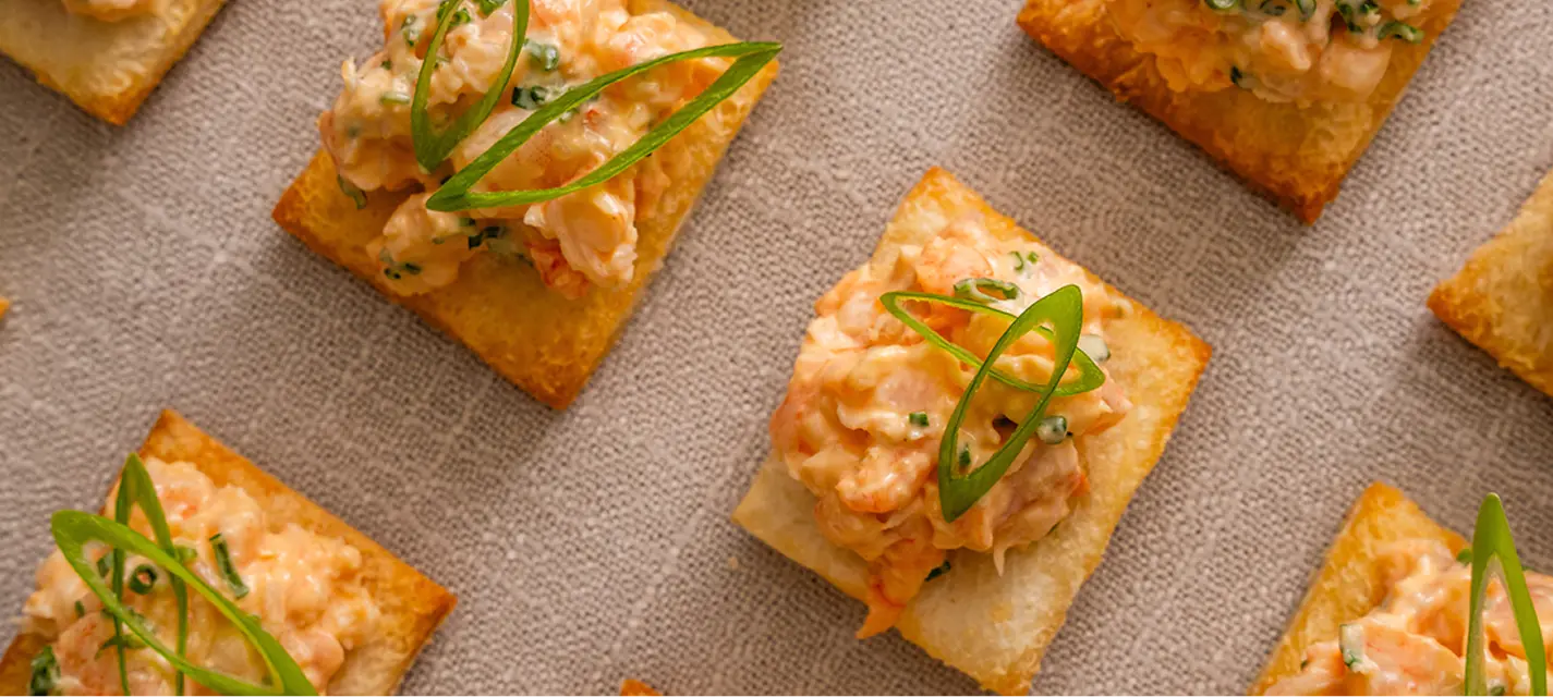 Prawn tartare canapés on crisp pastry with spring onion for a North Sydney event