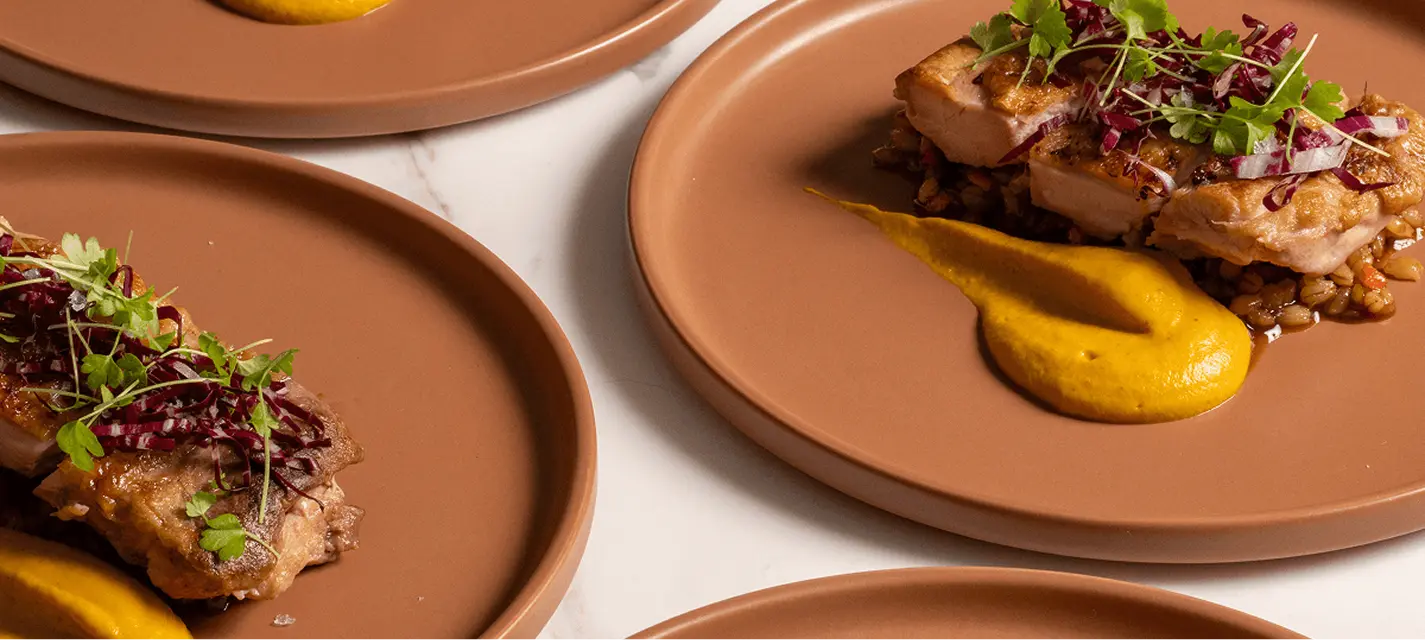Plated chicken courses with mustard purée and microherbs for an Inner West degustation