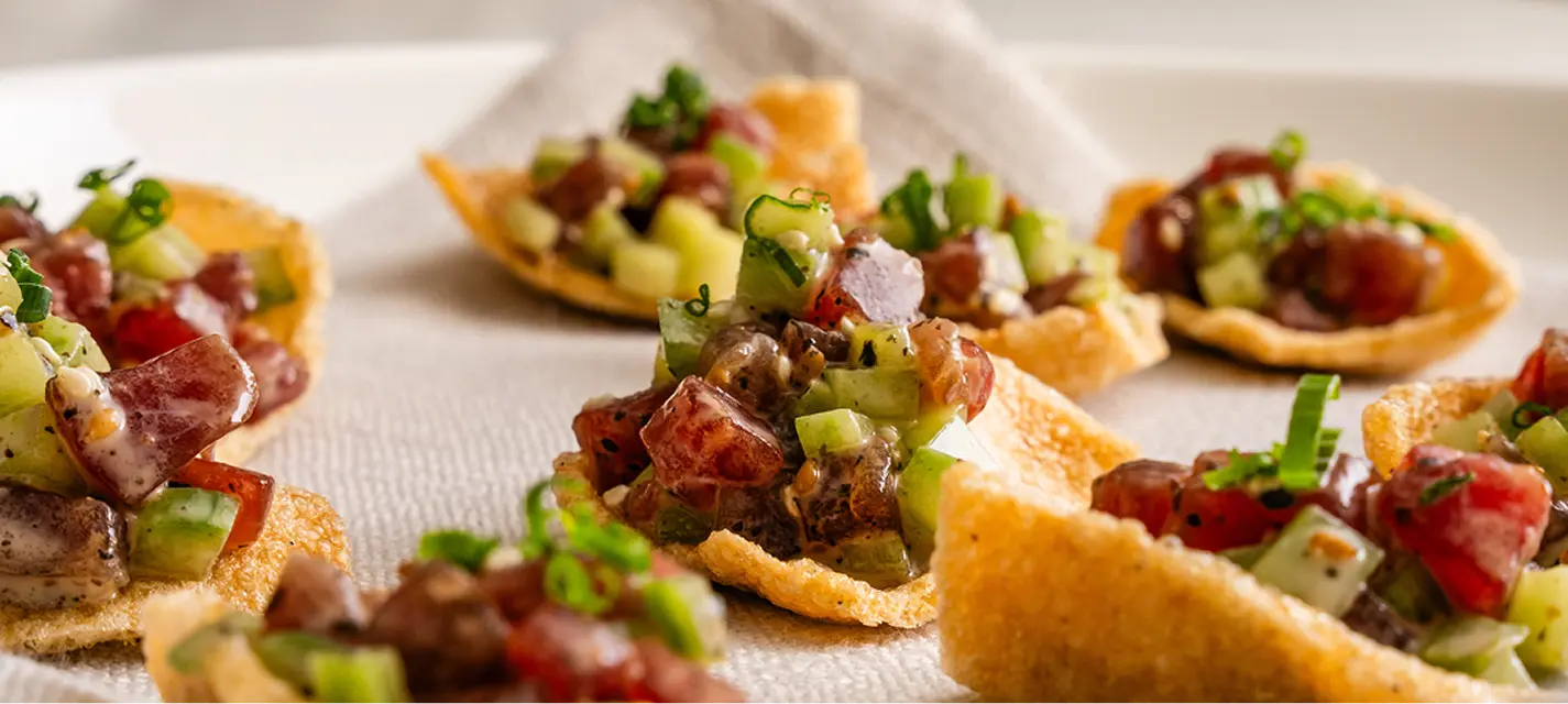 Tuna tartare tostada canapés with cucumber and spring onion for a Mosman party