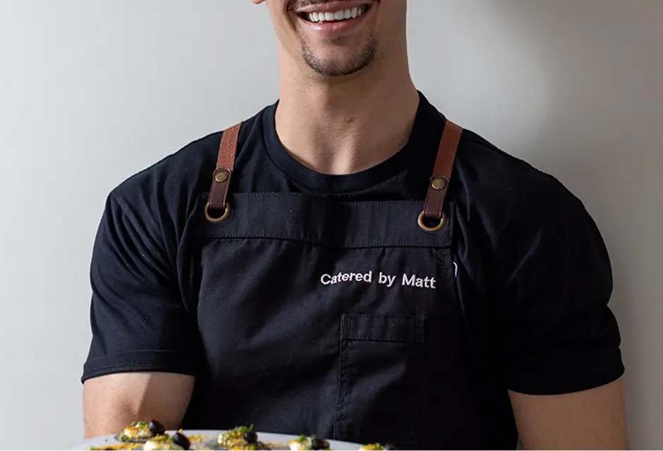 Catered by Matt chef holding a plate of canapés before service in Western Sydney