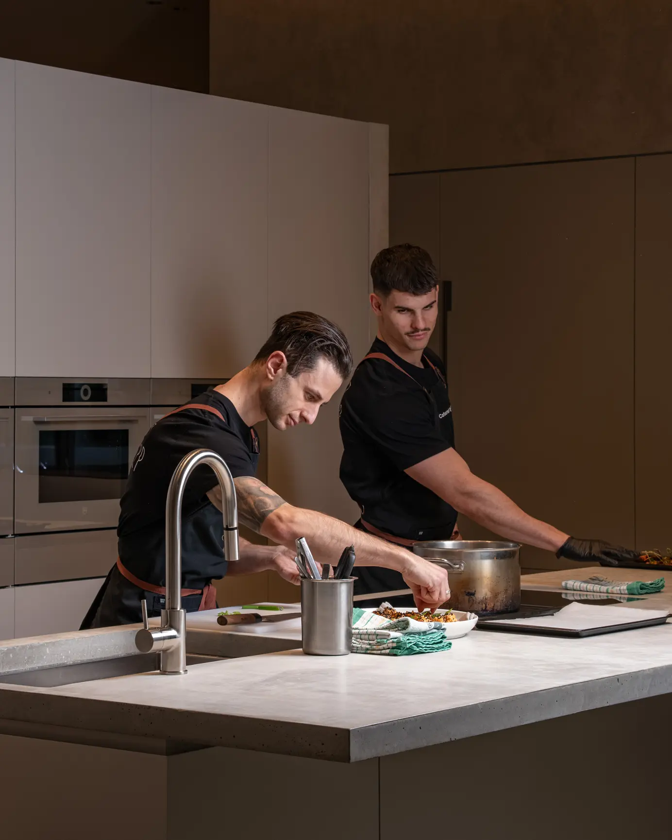 Catered by Matt chefs plating canapés for a Surry Hills party