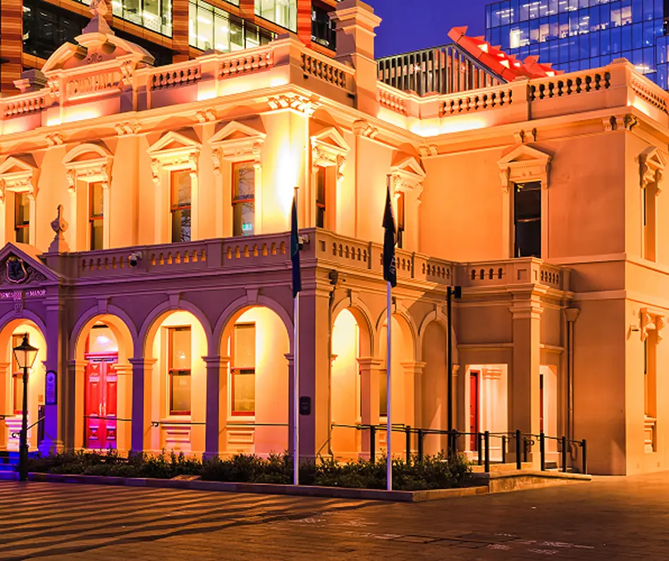 Heritage building lit at dusk in the heart of Parramatta