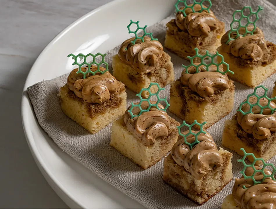 Bite sized dessert canapés piped with mousse, plated for a Sydney wake