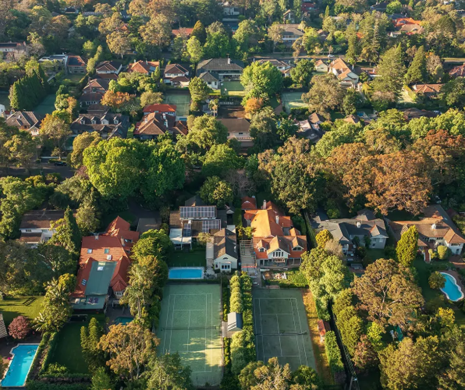 Leafy North Shore homes with pools and tennis courts from above