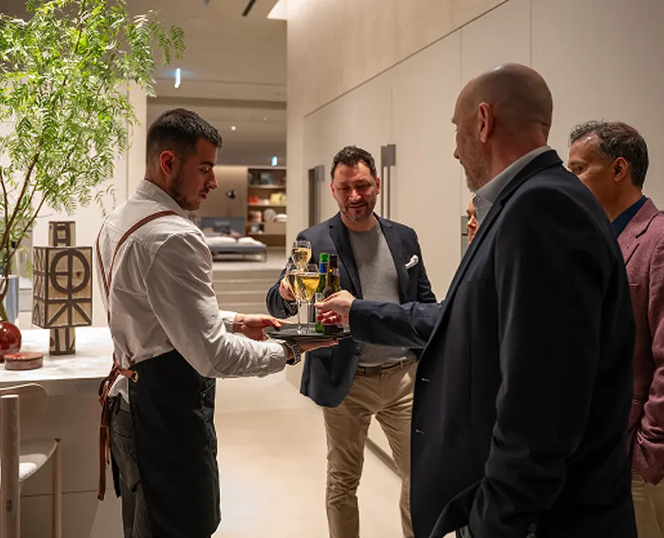 Waiter serving drinks to guests at a Parramatta corporate event