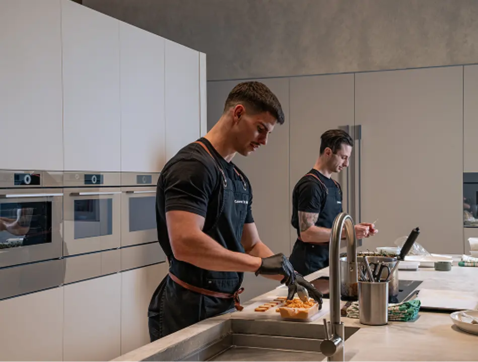 Chefs Matt and Vinnie preparing canapés in the kitchen for a fully managed Eastern Suburbs event