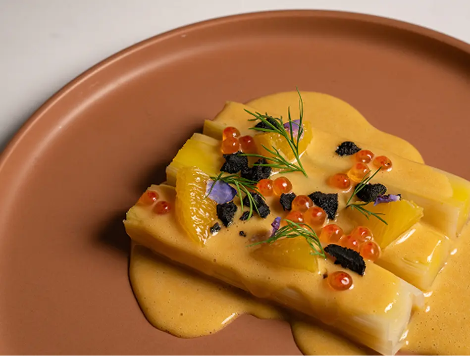 Plated entrée with salmon roe and caviar for a fully managed Penrith event