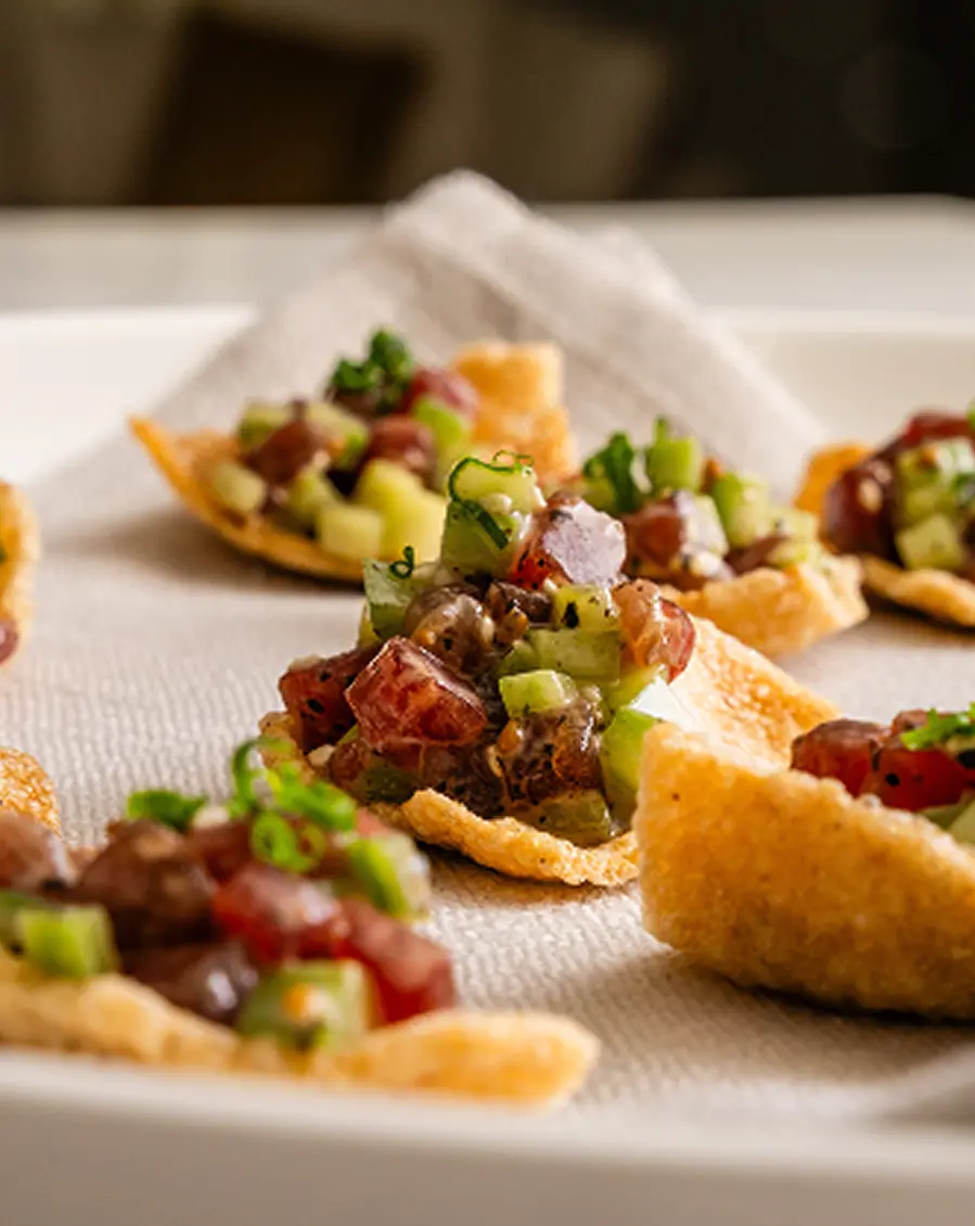 Tartare canapés on crisp pastry prepared for a Shire cocktail party
