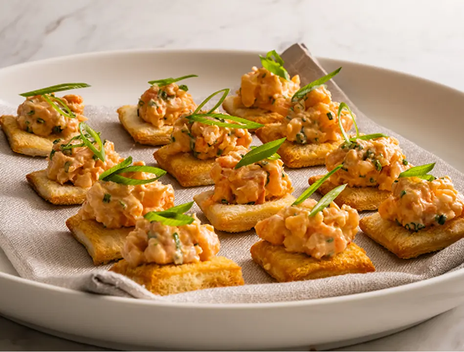 Seafood canapés with spring onion plated for a Chatswood party
