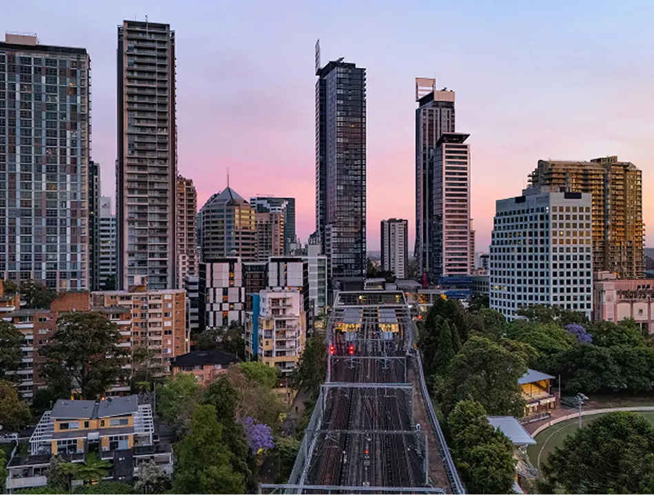 Chatswood towers and rail line at dusk