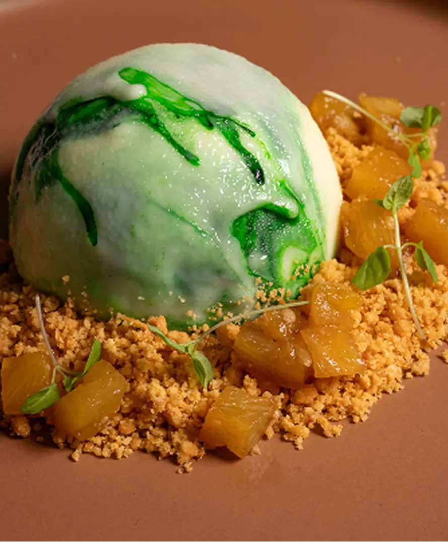 Plated dessert with pineapple and crumb from an Inner West degustation menu