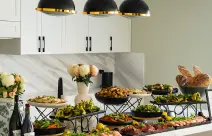 Buffet table of salmon and salads set for a Sydney engagement celebration