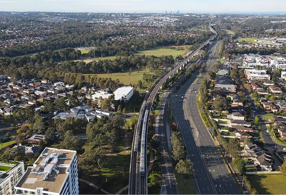 Aerial view over Western Sydney suburbs and the motorway corridor