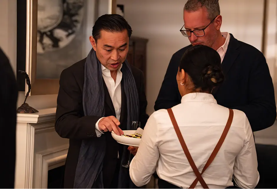 Waiter serving canapés to guests at a Parramatta function