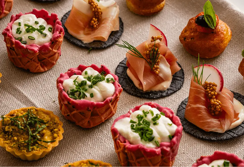 Tray of beetroot cups, prosciutto rounds and tartlets for a Surry Hills party