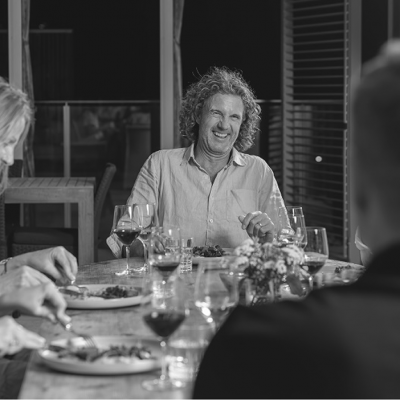 Guest smiling at private home catering in Sydney
