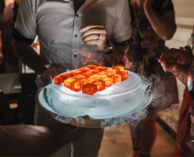 Cocktail jellies on a smoking dry ice platter at a Sydney party