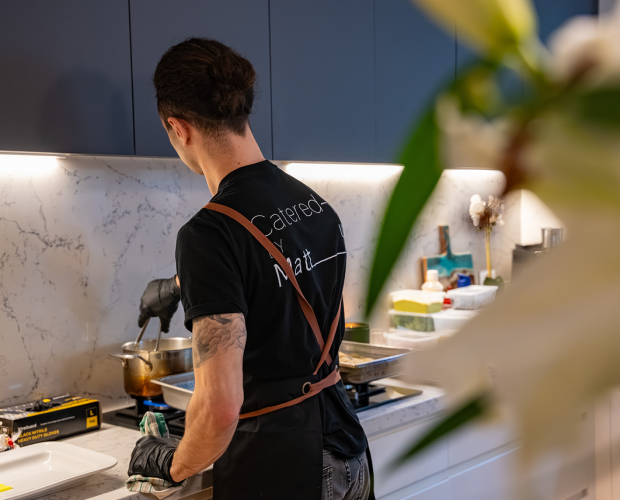 Chef finishing off dishes for Sydney event catering service